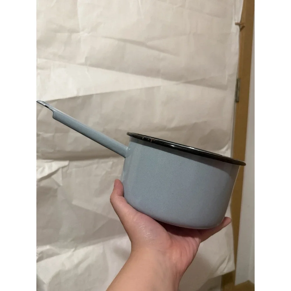 vintage light blue enamelware saucepan